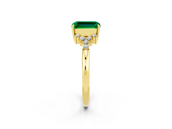 Yellow gold Emerald Cut Emerald Ring with Side Stones and Four-Prong Setting