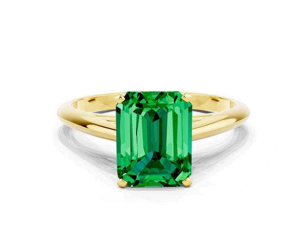 Yellow gold Emerald Cut Emerald Solitaire Engagement Ring with Cathedral Setting and Four-Prong Mount