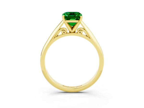 Yellow gold Emerald Cut Emerald Solitaire Engagement Ring with Cathedral Setting and Four-Prong Mount