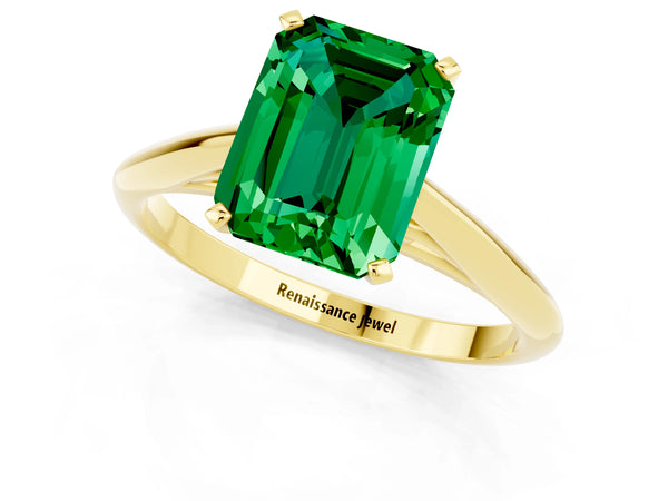 Yellow gold Emerald Cut Emerald Solitaire Engagement Ring with Cathedral Setting and Four-Prong Mount