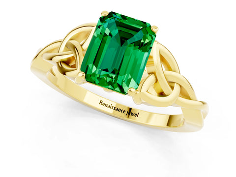 Yellow gold Emerald Cut Emerald Solitaire Engagement Ring with Celtic Knot Band and Four-Prong Setting_1