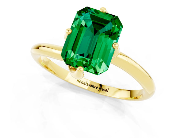 Yellow gold Emerald Cut Emerald Solitaire Engagement Ring with Four-Prong Setting and Classic Band