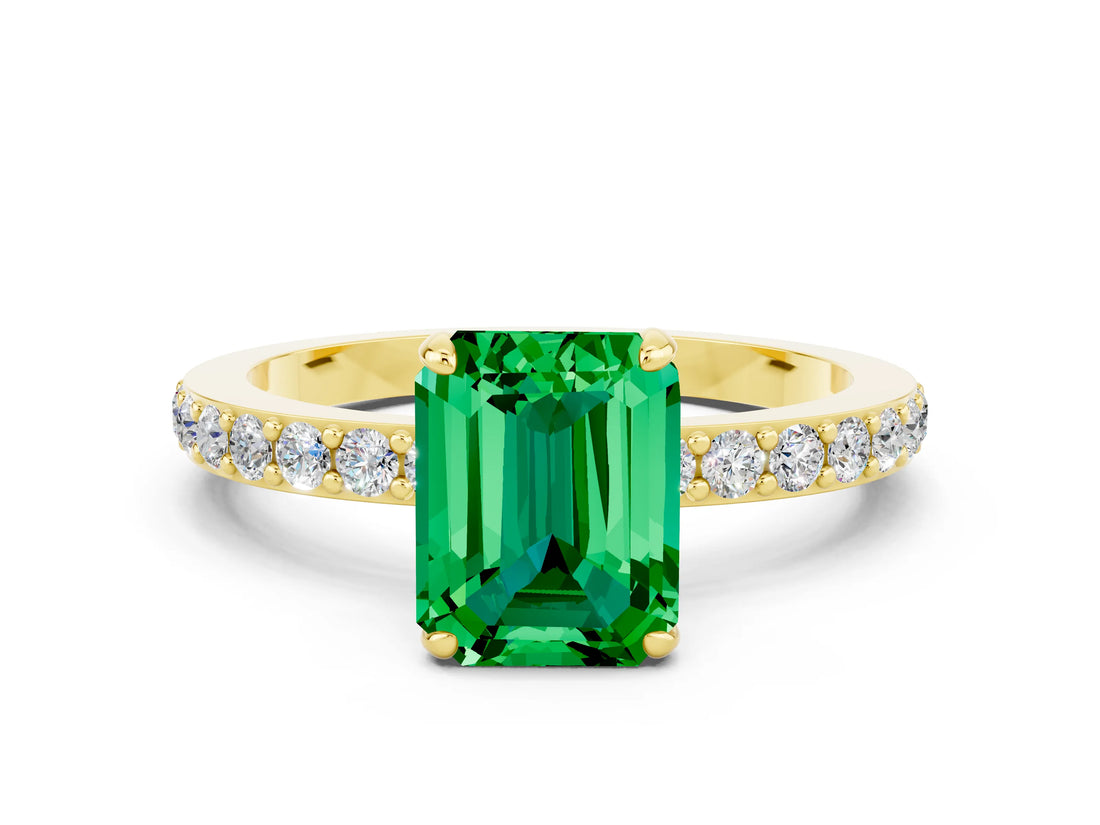 Yellow gold Emerald Cut Emerald Solitaire Engagement Ring with Pavé Band and Four-Prong Setting