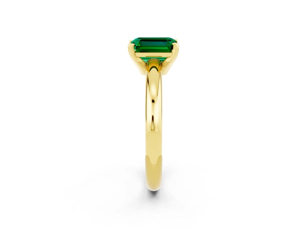 Yellow gold Emerald Cut Emerald Solitaire Engagement Ring with Round Band and Four-Prong Setting