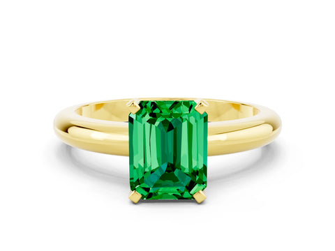 Yellow gold Emerald Cut Emerald Solitaire Engagement Ring with Round Band and Four-Prong Setting