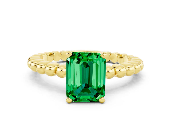 Yellow gold Emerald Cut Emerald Solitaire Ring with Beaded Band and Prong Setting