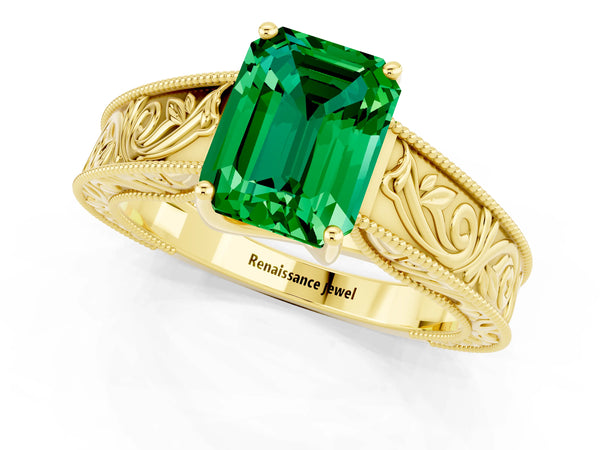 Yellow gold Emerald Cut Emerald Solitaire Ring with Engraved Band and Four-Prong Setting
