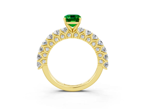 Yellow gold Emerald Cut Emerald Solitaire Ring with Shared Prong Pavé Band and Four-Prong Setting