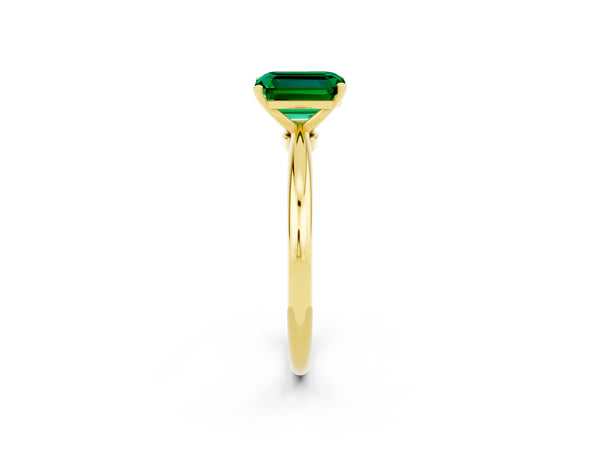 Yellow gold Emerald Cut Emerald Solitaire Ring with Six-Prong Setting and Classic Band