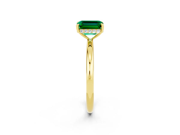 Yellow gold Emerald Cut Emerald Solitaire Ring with Thin Band and Four-Prong Setting