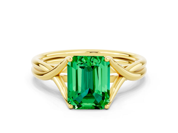 Yellow gold Emerald Cut Emerald Solitaire Twist Band Prong Setting Ring