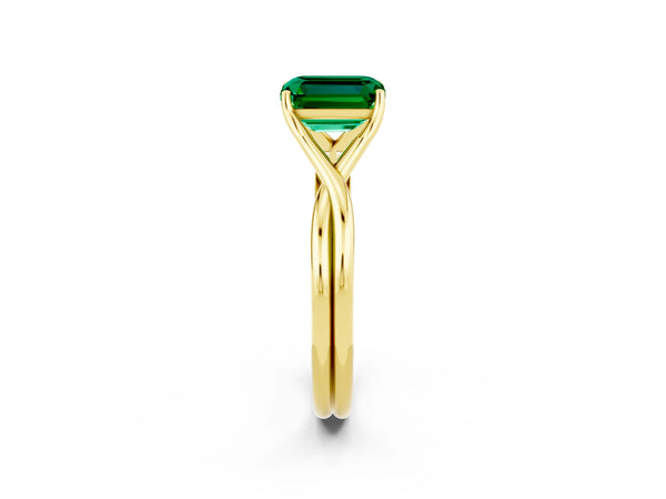Yellow gold Emerald Cut Emerald Solitaire Twist Band Prong Setting Ring