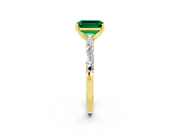 Yellow gold Emerald Cut Emerald Solitaire with Side Baguettes and Channel Set Band