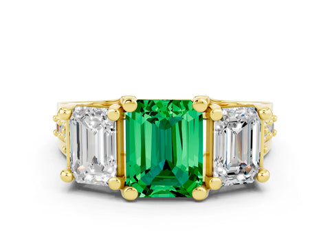 Yellow gold Emerald Cut Emerald Three-Stone Ring with Channel Set Band and Four-Prong Setting