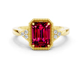 Yellow gold Emerald Cut Garnet Halo Ring with Tapered Band and Four-Prong Setting