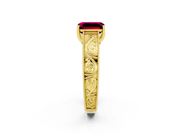 Yellow gold Emerald Cut Garnet Solitaire Ring with Engraved Band and Four-Prong Setting