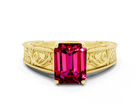 Yellow gold Emerald Cut Garnet Solitaire Ring with Engraved Band and Four-Prong Setting