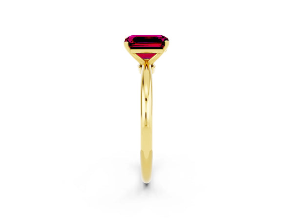Yellow gold Emerald Cut Garnet Solitaire Ring with Six-Prong Setting and Classic Band