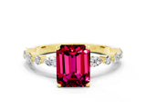 Yellow gold Emerald Cut Garnet Solitaire with Side Stones on a Pavé Band and Four-Prong Setting