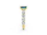 Yellow gold Emerald Cut Green Sapphire Prong Setting with Side Stones on a Pave Band_2