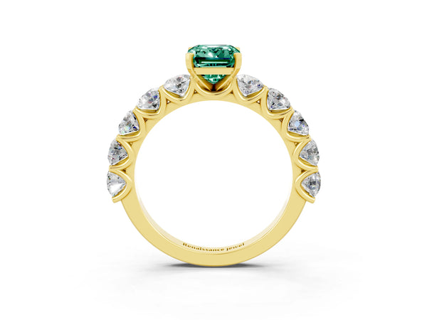 Yellow gold Emerald Cut Green Sapphire Prong Setting with Side Stones on a Pave Band
