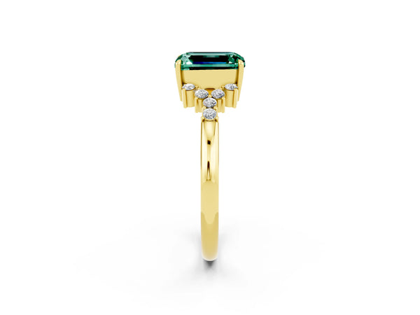 Yellow gold Emerald Cut Green Sapphire Ring with Side Stones and Four-Prong Setting