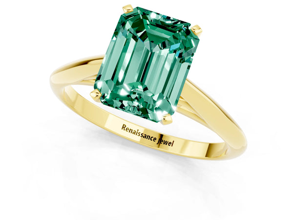 Yellow gold Emerald Cut Green Sapphire Solitaire Engagement Ring with Cathedral Setting and Four-Prong Mount