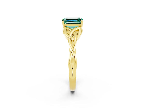 Yellow gold Emerald Cut Green Sapphire Solitaire Engagement Ring with Celtic Knot Band and Four-Prong Setting