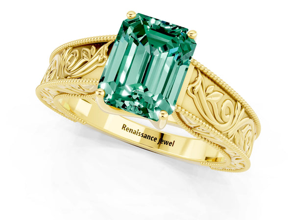 Yellow gold Emerald Cut Green Sapphire Solitaire Ring with Engraved Band and Four-Prong Setting