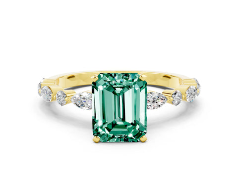 Yellow gold Emerald Cut Green Sapphire Solitaire with Side Stones on a Pavé Band and Four-Prong Setting