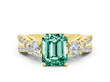 Yellow gold Emerald Cut Green Sapphire Three-Stone Ring with Pavé Split Shank and Four-Prong Setting