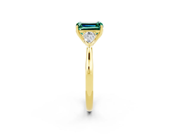 Yellow gold Emerald Cut Green Sapphire Three-Stone Ring with Pear  Side Stones and Prong Setting