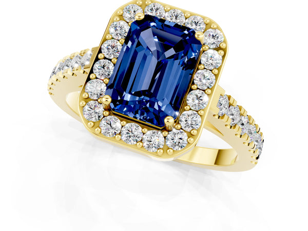 Yellow gold Emerald Cut Blue Sapphire Halo Ring with Round Pavé Split Shank and Prong Setting