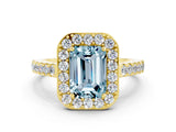Yellow gold Emerald Cut Halo Diamond Ring with Pavé Band and Three-Prong Setting