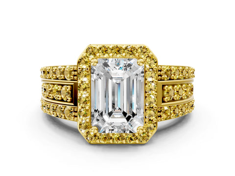 Yellow gold Emerald Cut Halo Diamond Ring with Round with Yellow Sapphire side stone Split Shank and Prong Setting