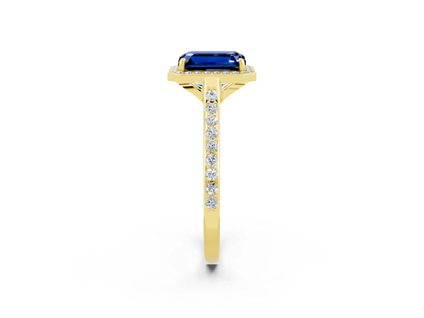 Yellow gold Emerald Cut Blue Sapphire Halo Engagement Ring with Round Pavé Shoulders and Prong Setting