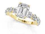 Yellow gold Emerald Cut Moissanite Prong Setting with Side Stones on a Pave Band_1