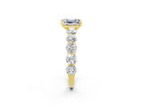 Yellow gold Emerald Cut Moissanite Prong Setting with Side Stones on a Pave Band_2