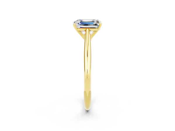 Yellow gold Emerald Cut Moissanite Solitaire Engagement Ring with Cathedral Setting and Four-Prong Mount