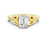 Yellow gold Emerald Cut Moissanite Solitaire Engagement Ring with Celtic Knot Band and Four-Prong Setting