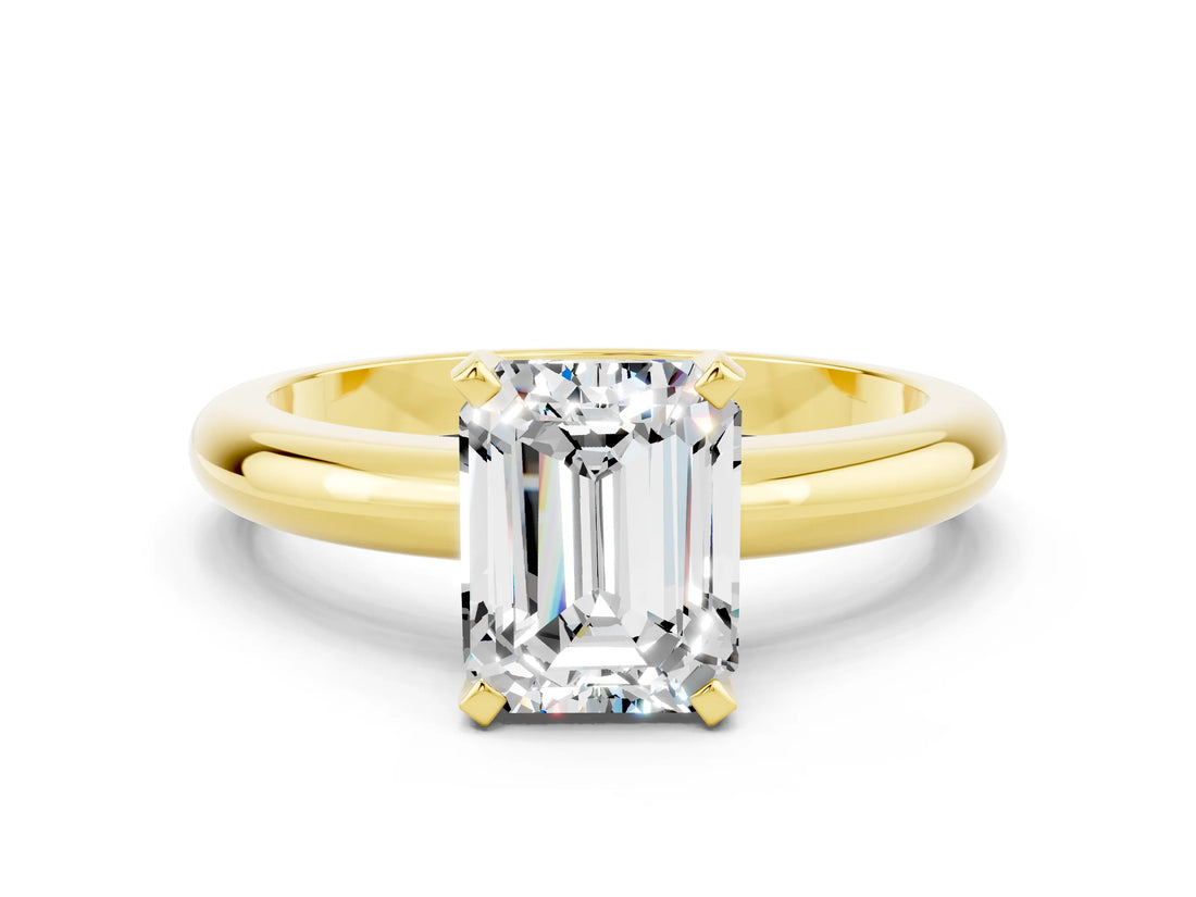 Yellow gold Emerald Cut Moissanite Solitaire Engagement Ring with Round Band and Four-Prong Setting