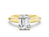 Yellow gold Emerald Cut Moissanite Solitaire Engagement Ring with Round Band and Four-Prong Setting