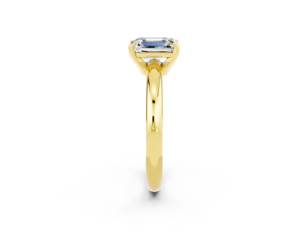 Yellow gold Emerald Cut Moissanite Solitaire Engagement Ring with Round Band and Four-Prong Setting