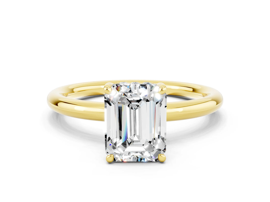 Yellow gold Emerald Cut Moissanite Solitaire Ring with Thin Band and Four-Prong Setting