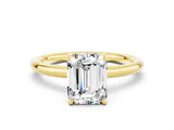 Yellow gold Emerald Cut Moissanite Solitaire Ring with Thin Band and Four-Prong Setting