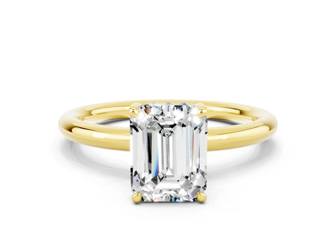 Yellow gold Emerald Cut Moissanite Solitaire Ring with Thin Band and Four-Prong Setting