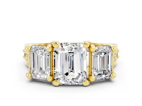 Yellow gold Emerald Cut Moissanite Three-Stone Ring with Channel Set Band and Four-Prong Setting