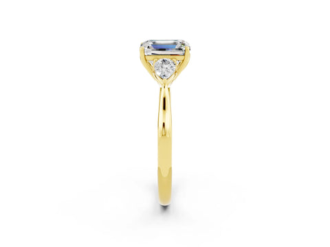 Yellow gold Emerald Cut Moissanite Three-Stone Ring with Pear Side Stones and Four-Prong Setting_14