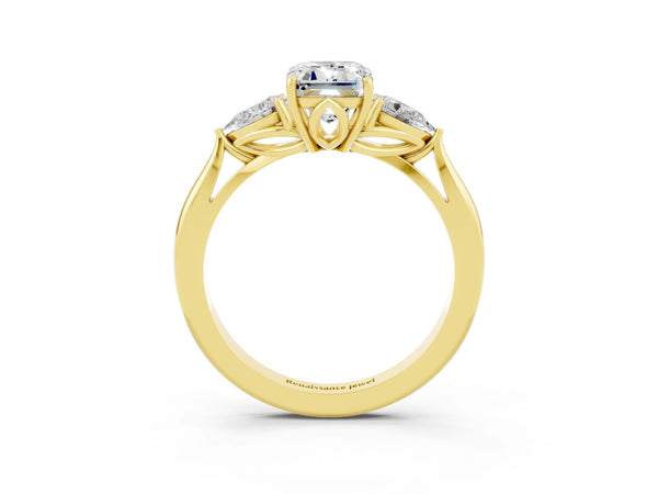 Yellow gold Emerald Cut Moissanite Three-Stone Ring with Pear  Side Stones and Prong Setting