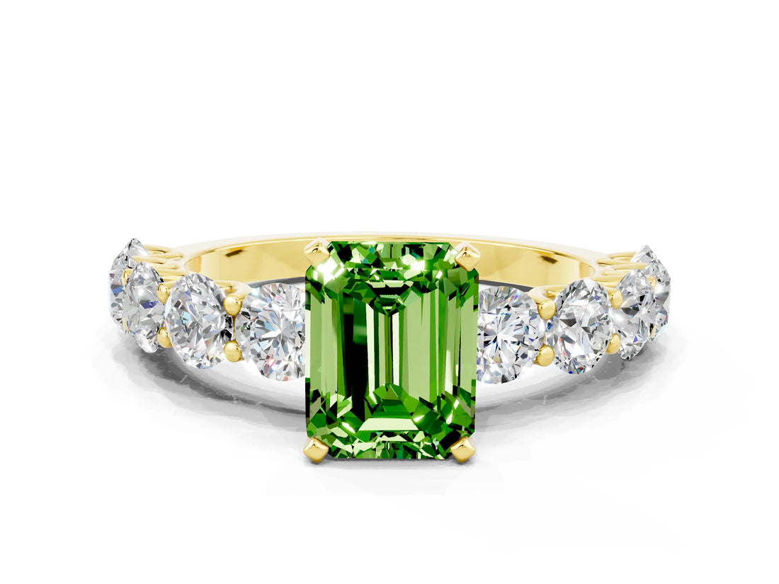 Yellow gold Emerald Cut Peridot Prong Setting with Side Stones on a Pave Band